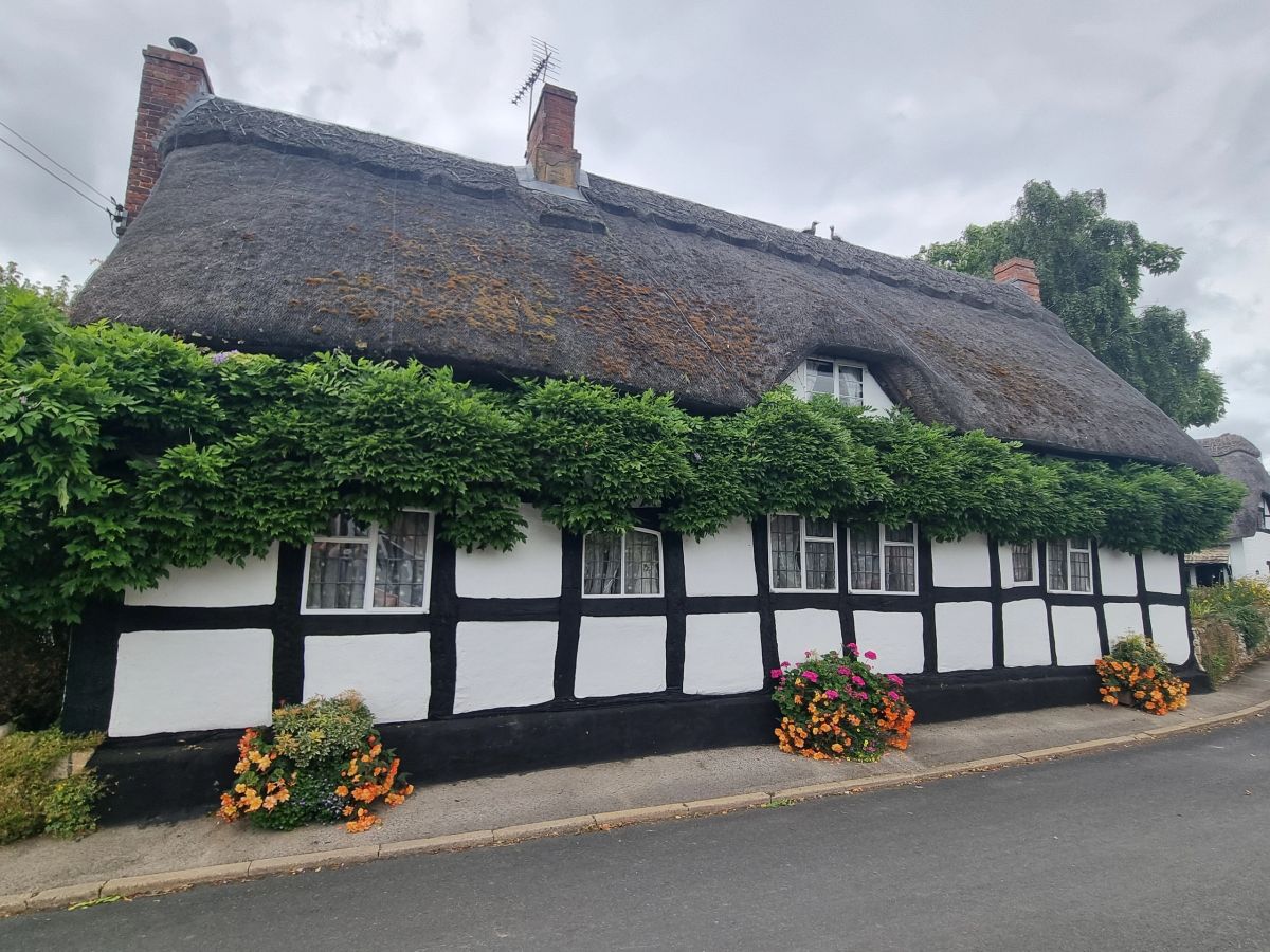 Thatched timber-framed cottage previously surveyed